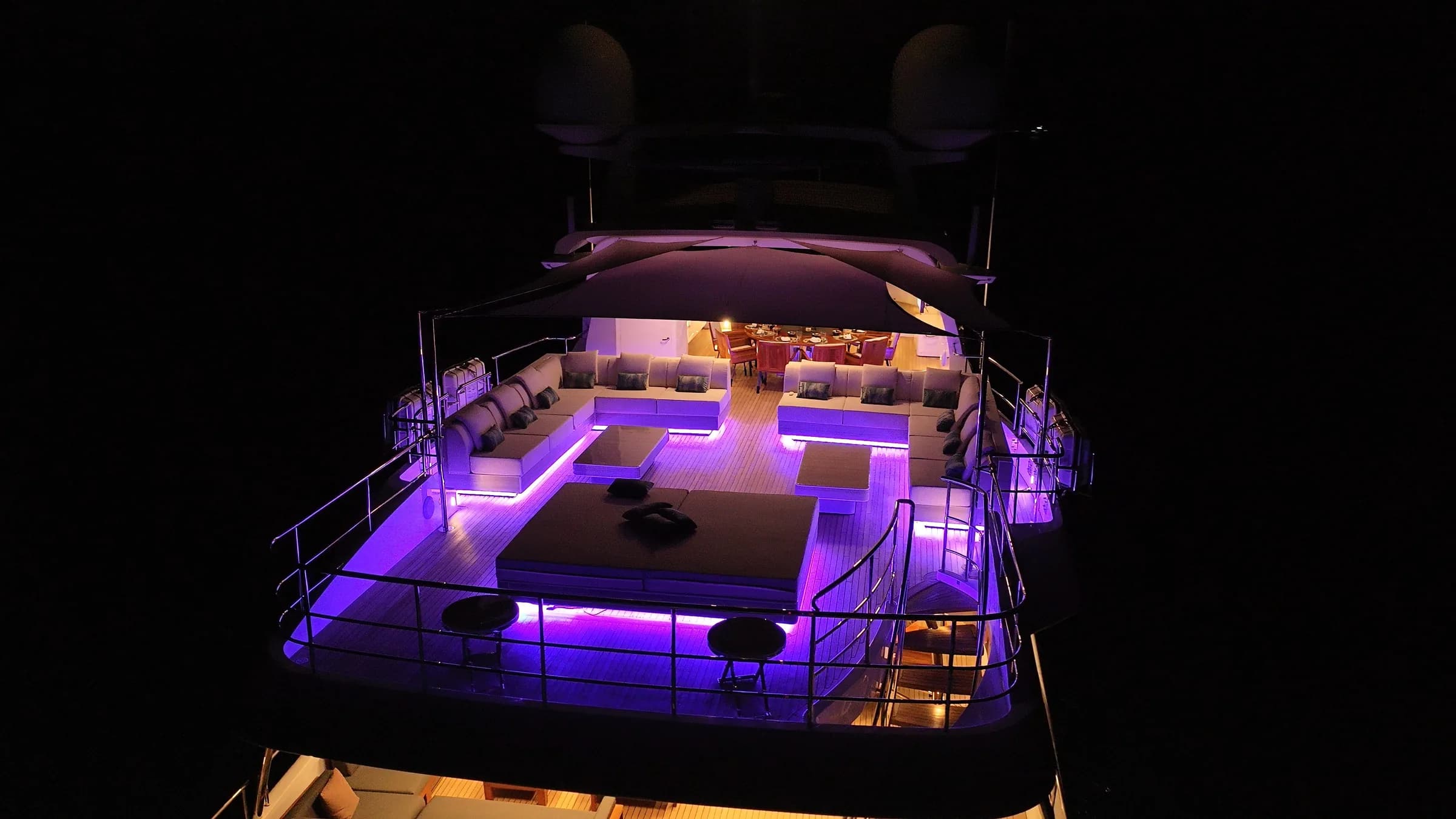 The sun deck after dark, under its RGB lighting