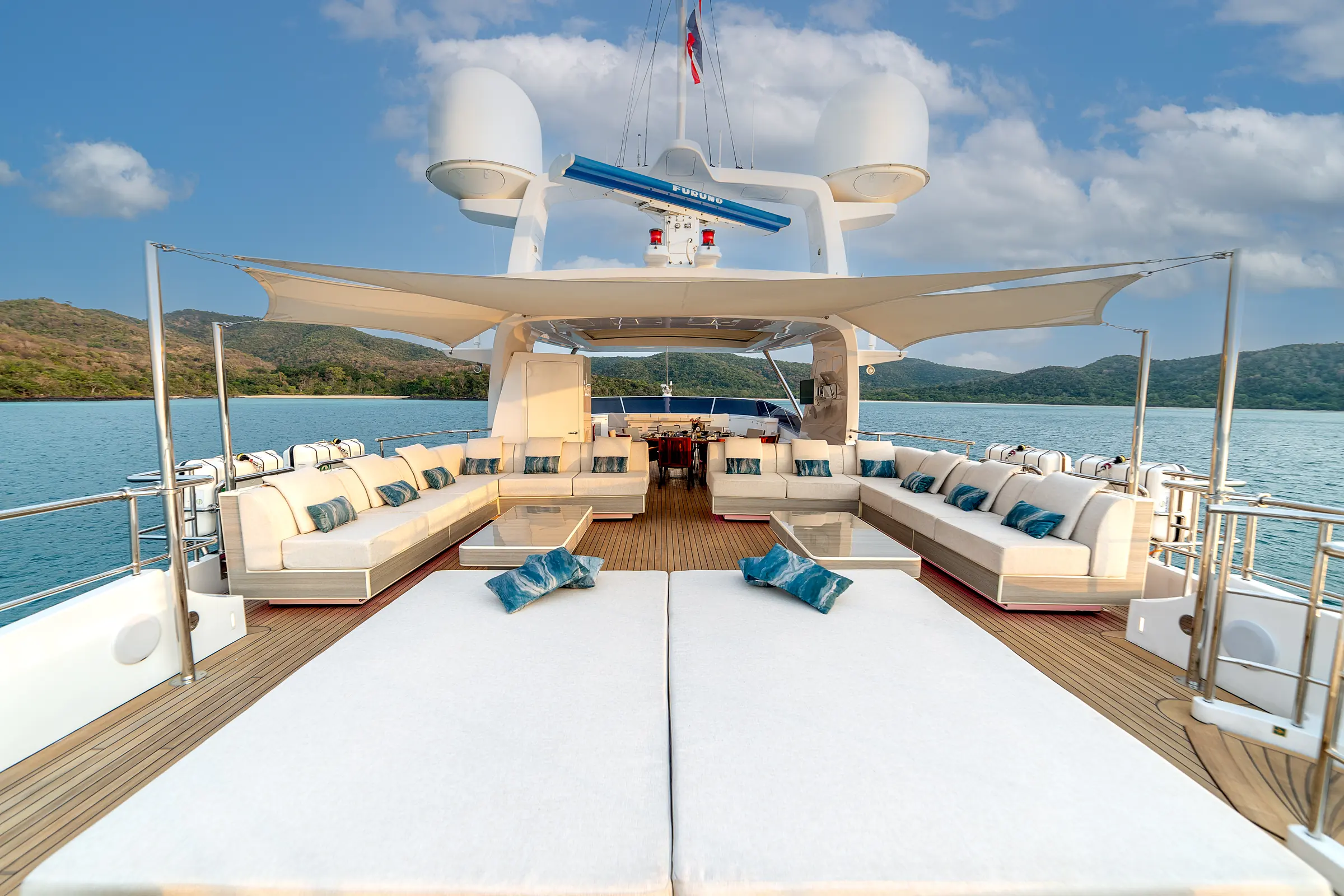 The sun deck, sunpad forward and loungers aft
