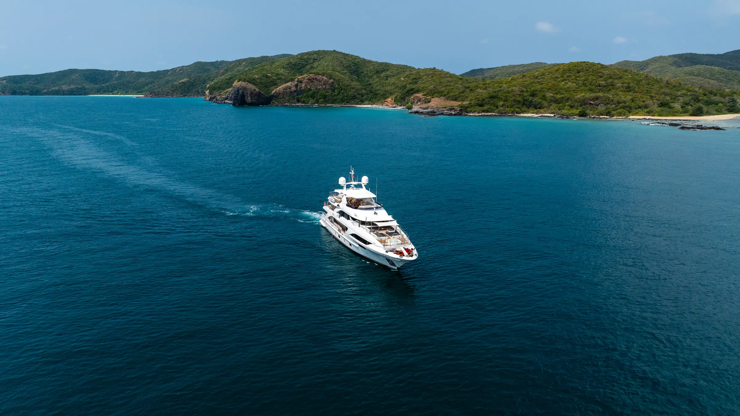 Asia Poseidon anchored in a wide bay