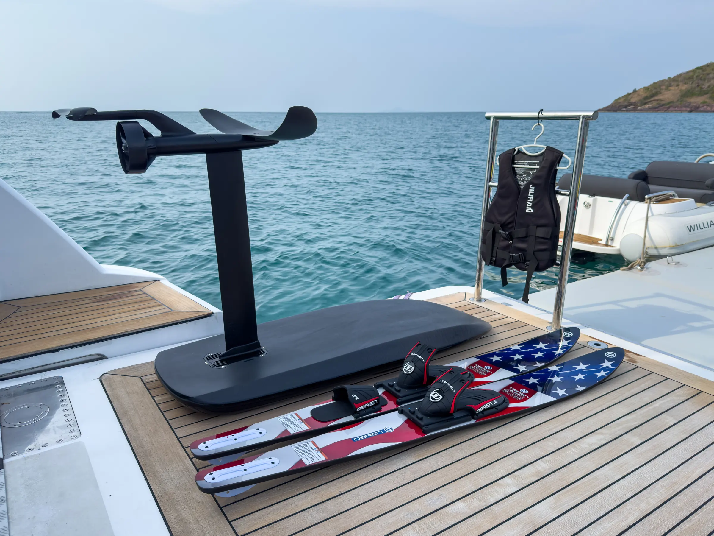 The Fliteboard and water skis on the swim platform